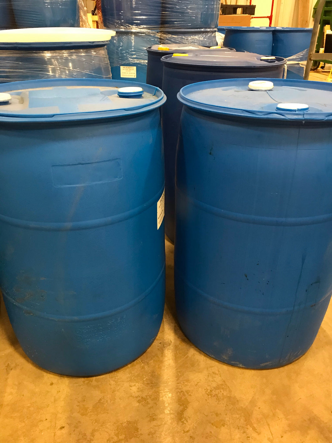 55-gallon closed top plastic drums